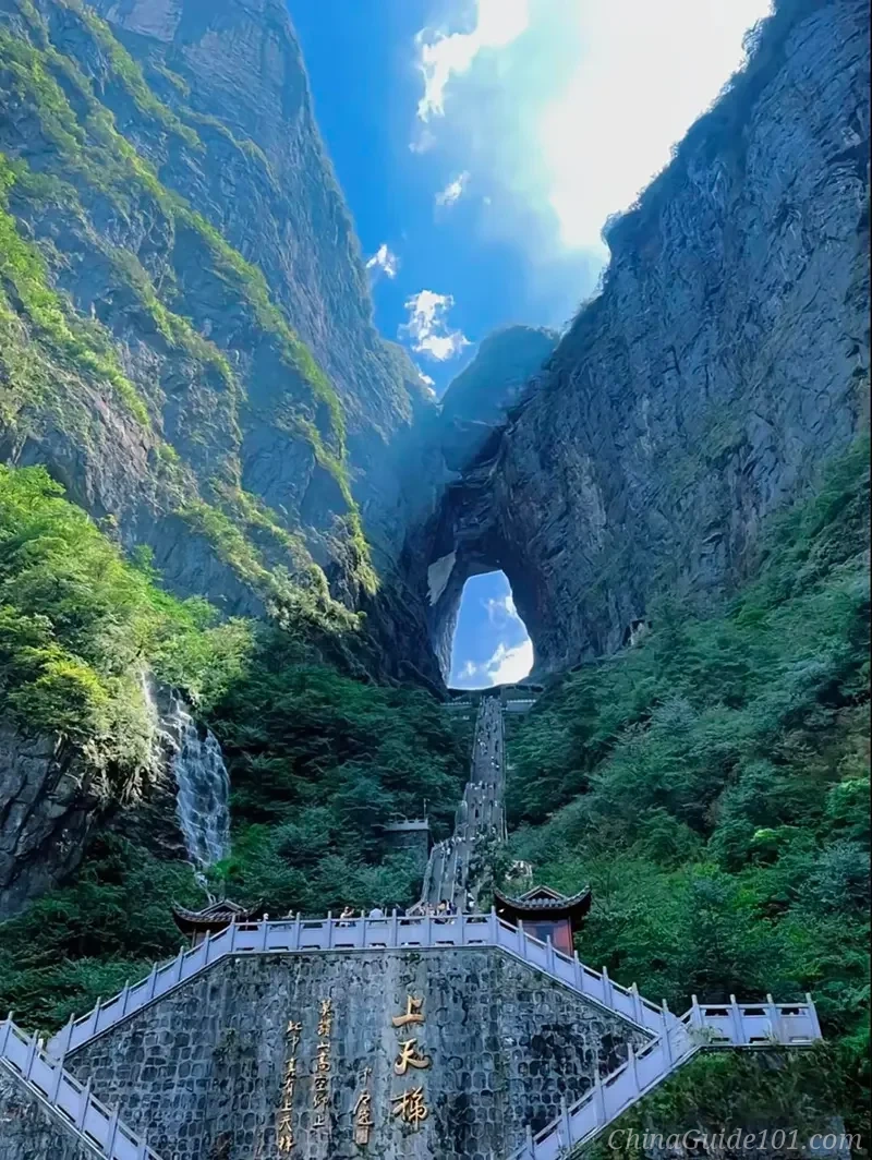 An awe-inspiring, bottom-up perspective photograph looking up the 'Stairway to Heaven' at Tianmen Mountain, Zhangjiajie.