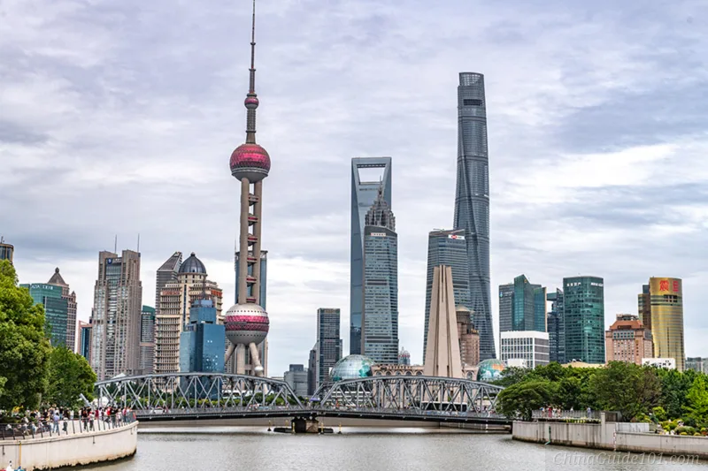 View of Waibaidu Bridge over Suzhou Creek with the iconic Lujiazui financial district skyline and Oriental Pearl Tower in Shanghai