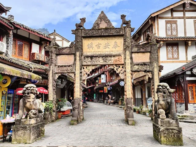 Stone memorial archway at the entrance of Tai'an Ancient Town near Qingcheng Back Mountain, Sichuan
